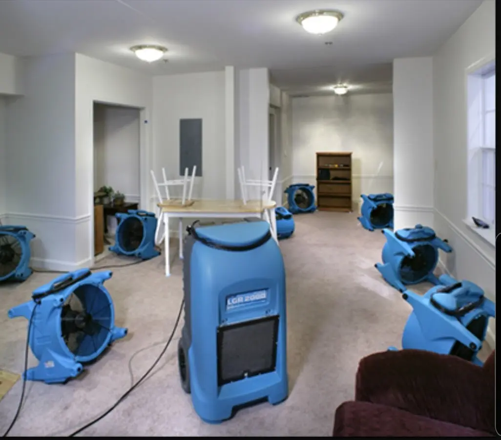 Air movers and dehumidifier setup for Water Damage Restoration in Carteret
